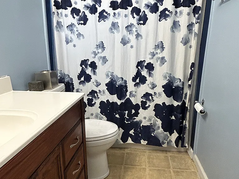 Full bathroom located at the front of the home.