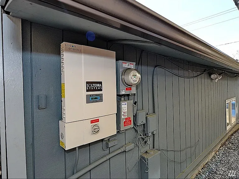 This home is powered by solar energy!! Reducing your electric bill and carbon footprint.