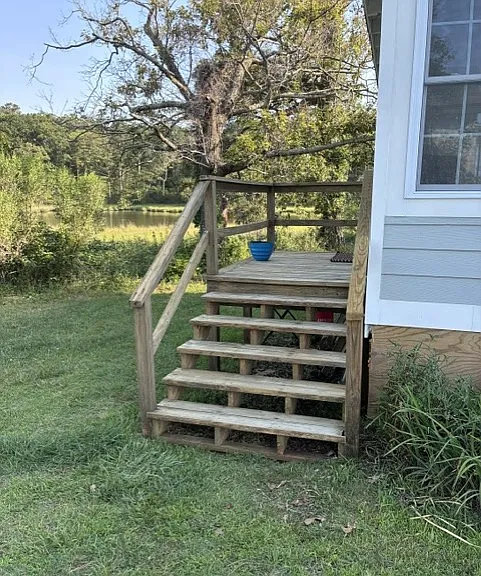 Left side of house and side deck
