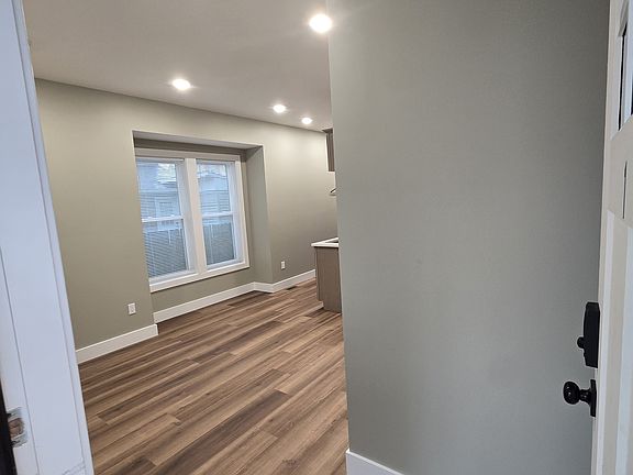 Once you open the door to your apartment you are greeted by the living room.