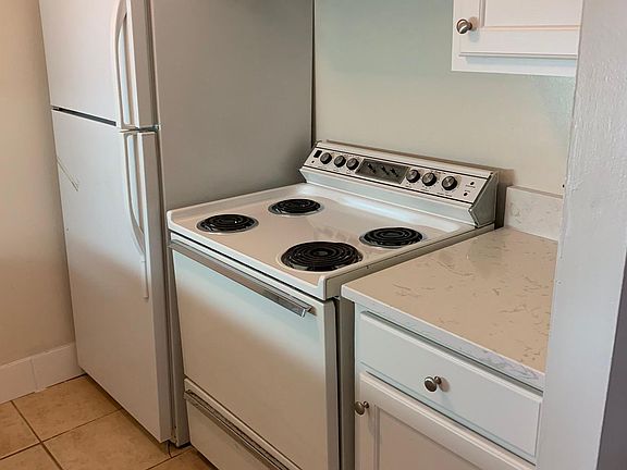 Other side of kitchen.Kitchen has new stove but not shown in this picture.