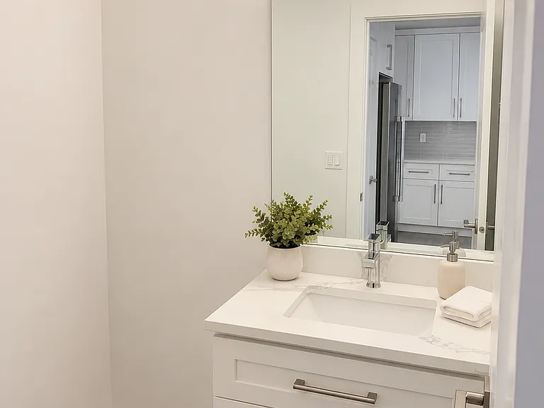 Powder room (half bath) in the ground floor