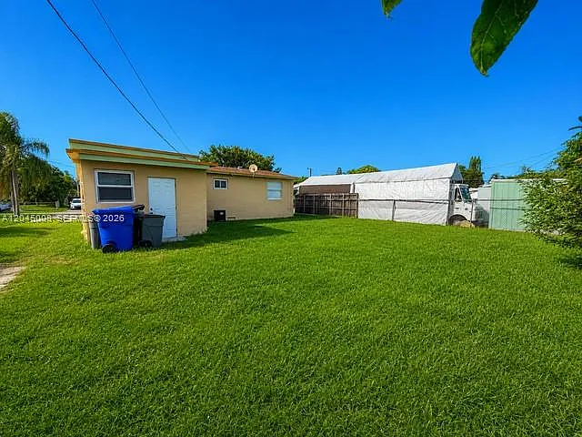 7720 Raleigh St — Photo 18