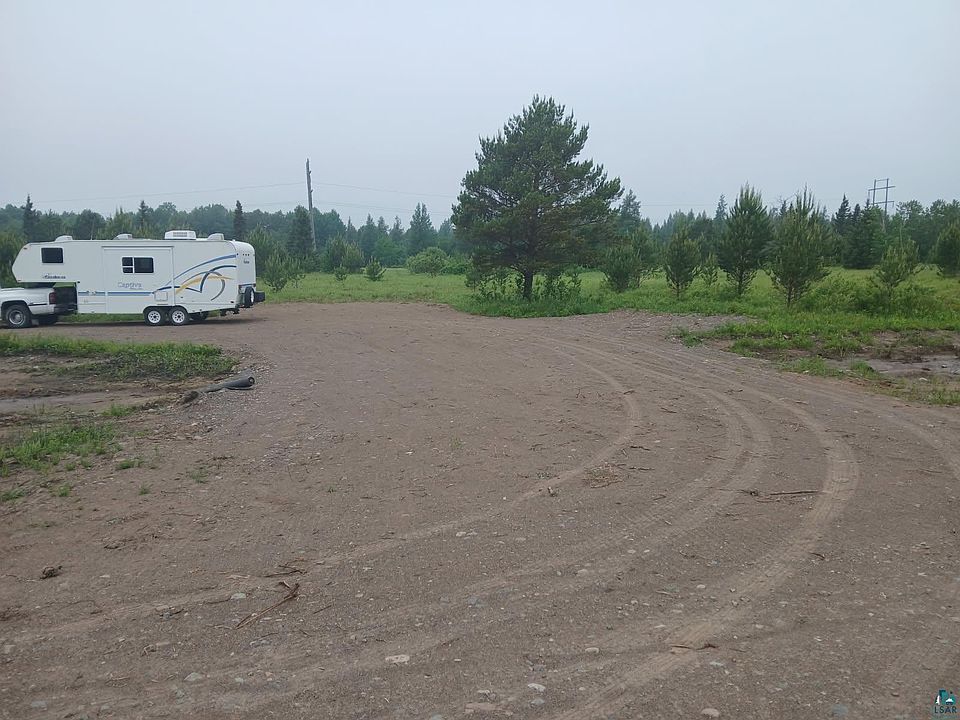 1st image of 7473 Comstock Lake Rd Lot #1 behind 7473