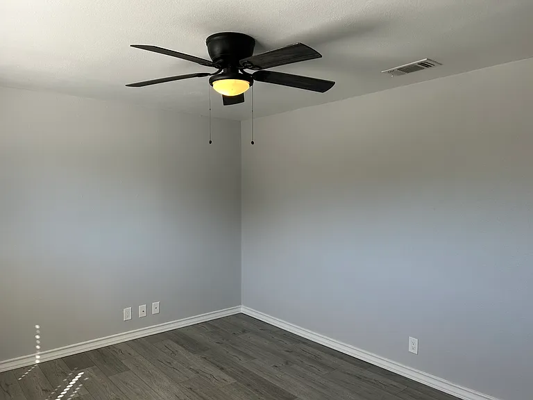 2nd Bedroom. Ceiling fan to help with those electric bills.