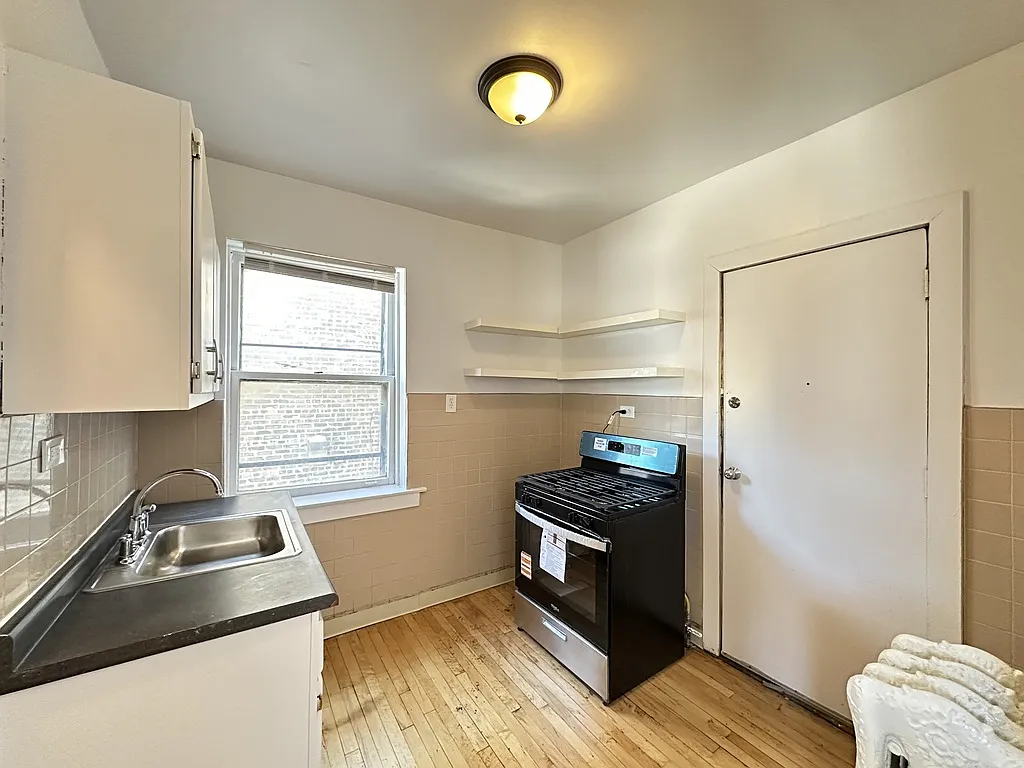 Building Photo - 7147 S Constance Ave #E3