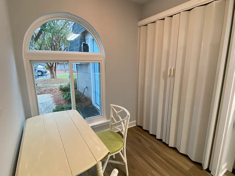 Laundry room located in kitchen
