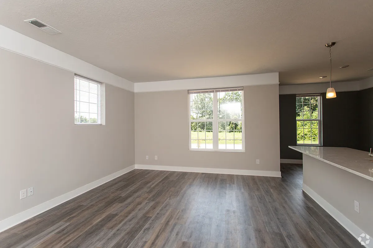 The Drake Living Room with Wide Open Space! - The Flats on Houk