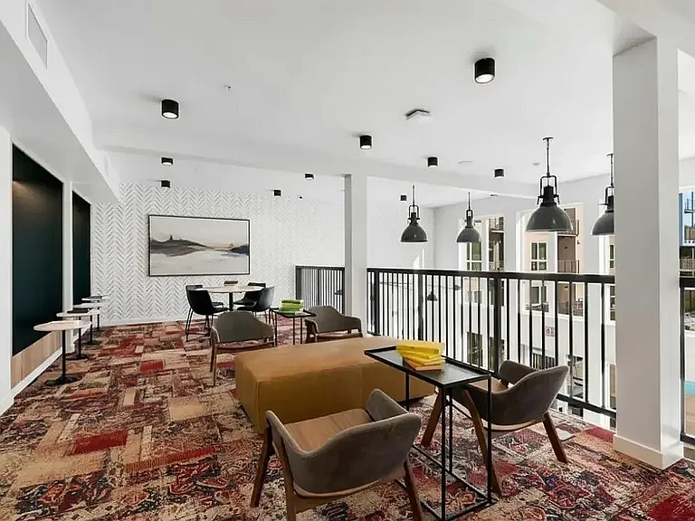 Experience the blend of comfort and style in this contemporary apartment lounge at 805 Riverfront Apartments in Sacramento