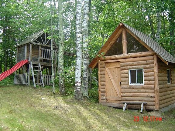 Log playhouse and play gym