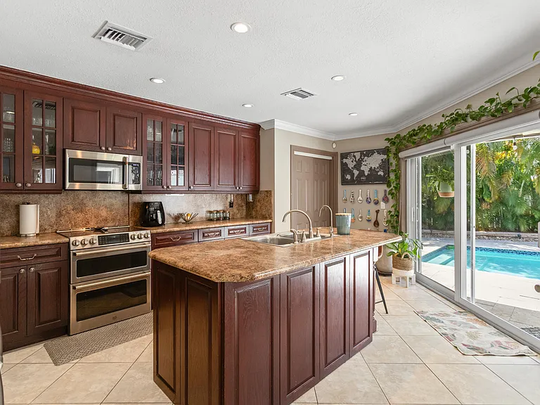 4050 NW 7th Ln — Photo 42