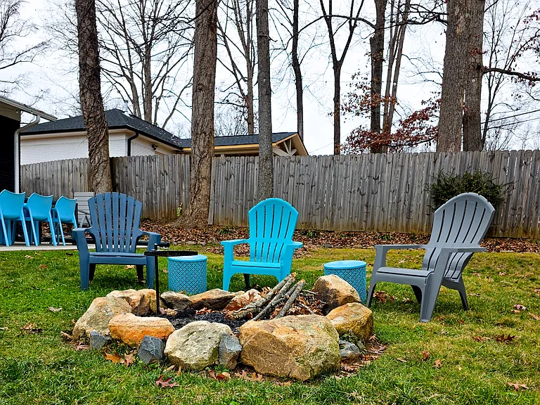 Fire pit and seating- perfect for making smores and enjoying the large outdoor space year-round.