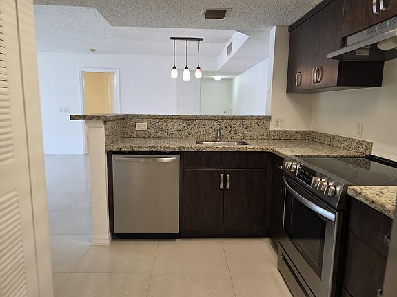 5th image of 5055 Wiles Rd APT 207