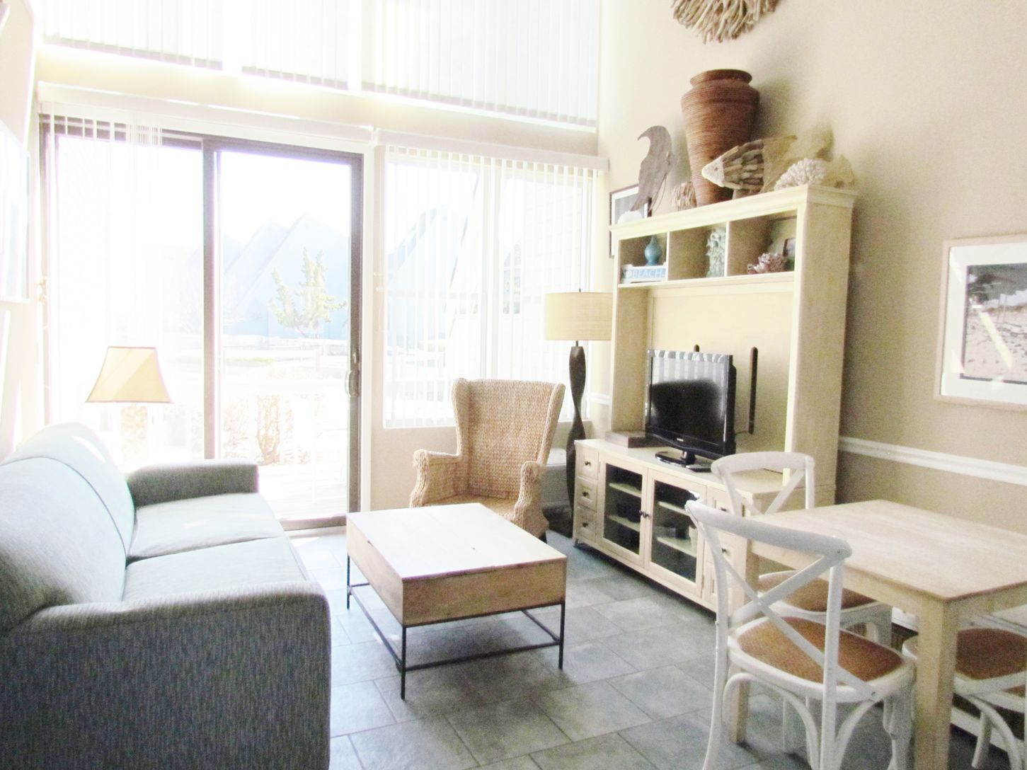 Sunny Living Room Leading to Deck