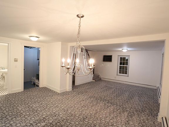 first floor left of front door, entrance to washer/dryer, house systems