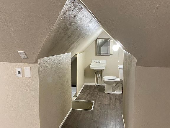 Hallway to downstairs and Upstairs bathroom