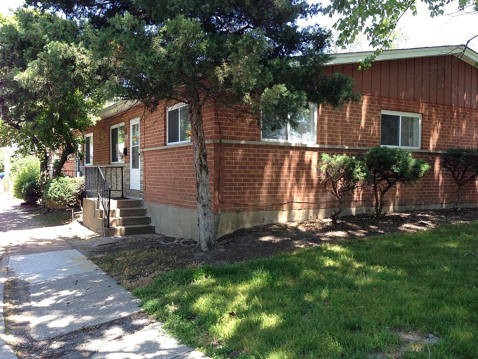 Nice 4 family building - corner of Olive & Backer right across the street from Heman Park