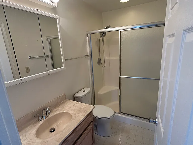main level bath with access from hall or 2nd bedroom