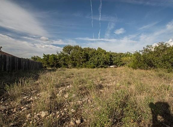 View of flat, cleared area. The entire lot is flat.