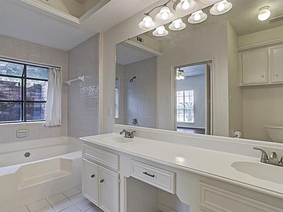 Master bathroom with a garden tub and his and her sinks.