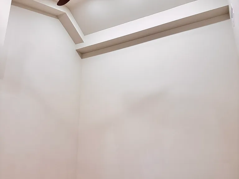 Bedroom 1 - High Ceiling with recessed lights and fan