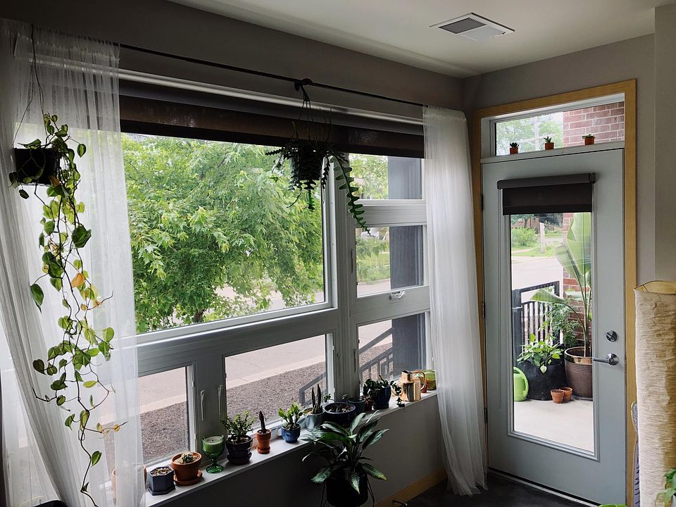 Large living room window and door to patio