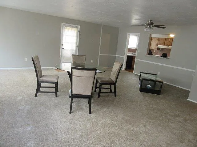 The Drake living room in 3 bedroom unit