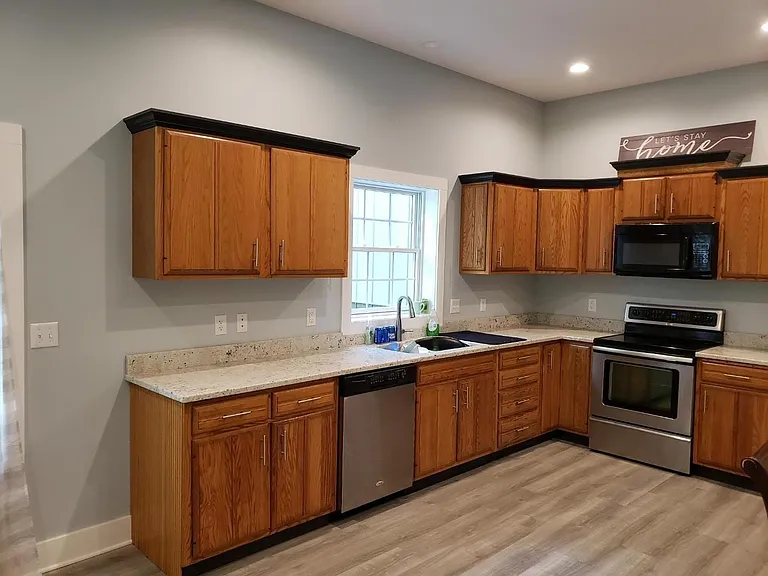 Granite countertops, stainless steel appliances