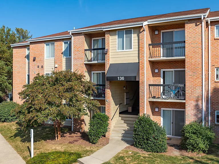 Experience contemporary living in this charming brick apartment with private balconies.