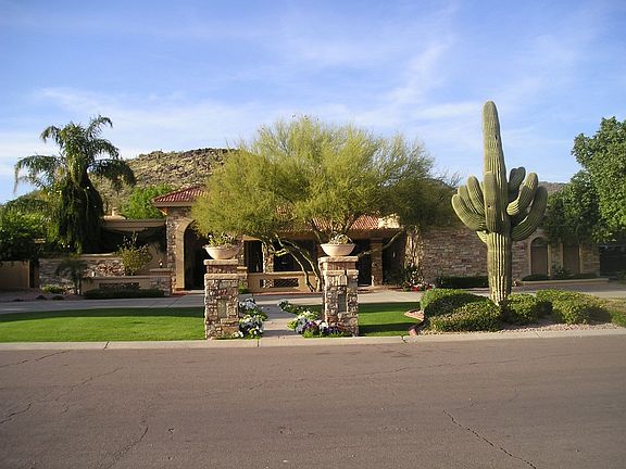 Front View, circular driveway, NS exposure.