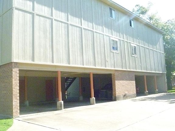 back of building parking garage on first floor