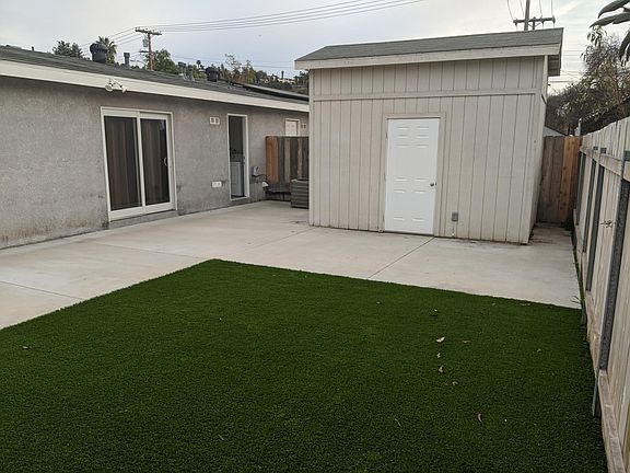 Backyard with storage shed