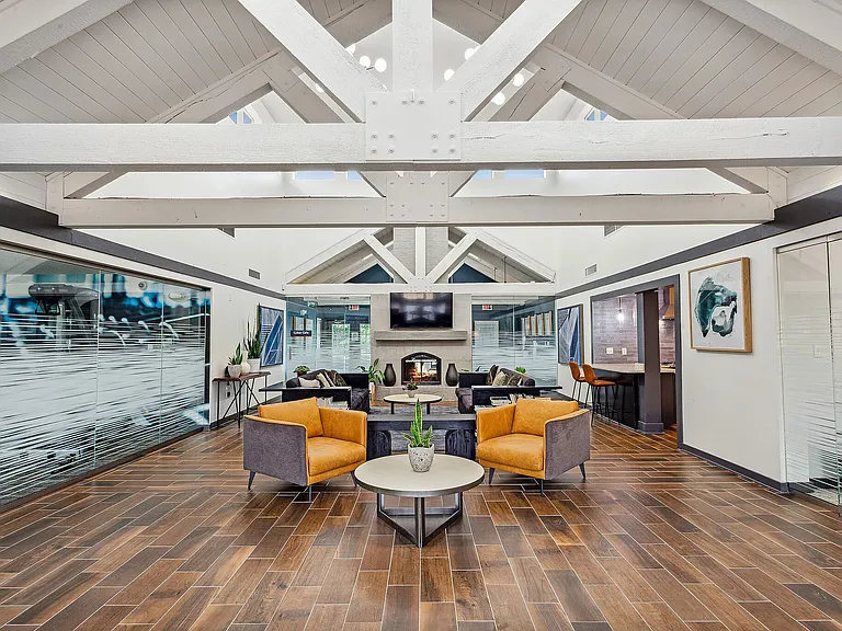 Step into contemporary comfort at Eagle Rock Apartments at Belcamp. This stunning lounge area features modern decor and inviting seating, perfect for relaxation or social gatherings. Explore your new home today!