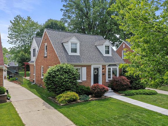 Beautiful Red Brick Cape Cod