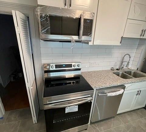 New Kitchen, New Appliances, New Floors and Countertops, New Cabinets
