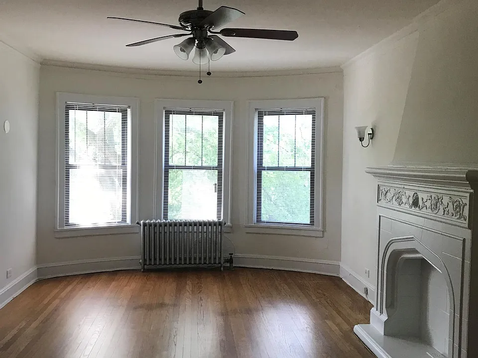 Living room with decorative fireplace