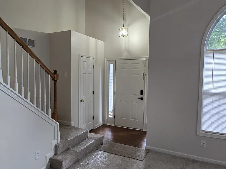 Shot from the living room looking to the front entry