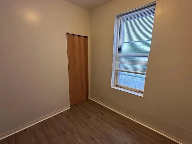 Second bedroom ideal for guest room, office, or additional storage