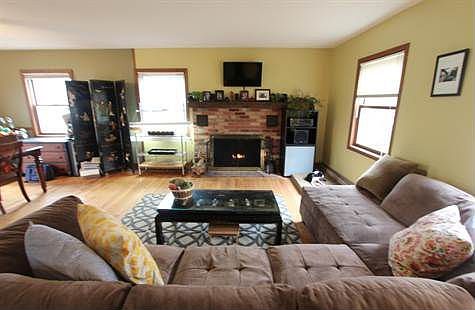 Livingroom with wood burning fireplace
