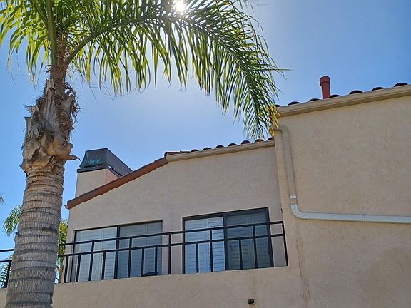 BACK OF THE UPSTAIRS UNIT.