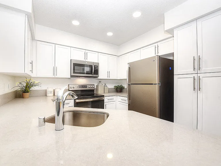 2 Bedroom 2 Bath-Beautifully Upgraded Kitchen: Quartz Counters, New Appliances, New Cabinets and Much More!