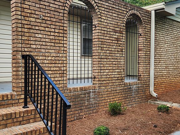 Front porch with private sitting area. Great place to enjoy your morning coffee.