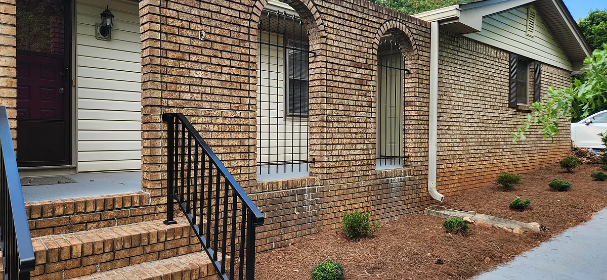Front porch with private sitting area. Great place to enjoy your morning coffee. - 5787 Lorraine Dr