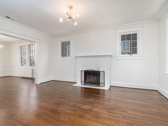 Wood-burning fireplace in formal living room
