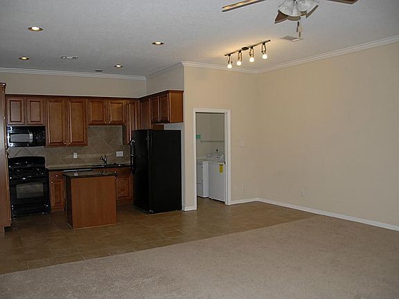 SPACIOUS FAMILY ROOM OPEN TO KITCHEN