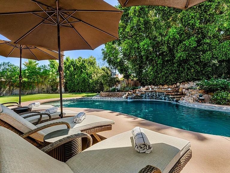 Salt pool with Heater , Lounge chairs and umbrellas
