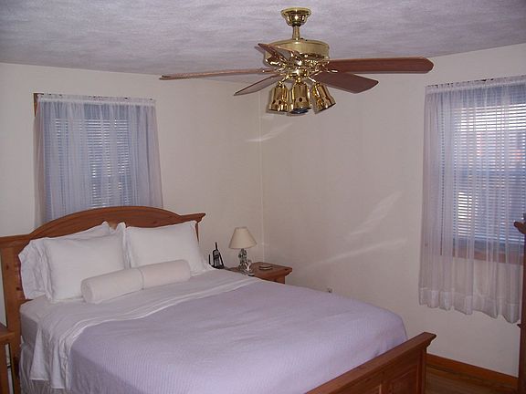 This is one of the four huge bedrooms.