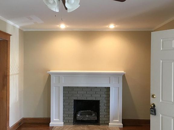 living room: mantle has outlet for TV