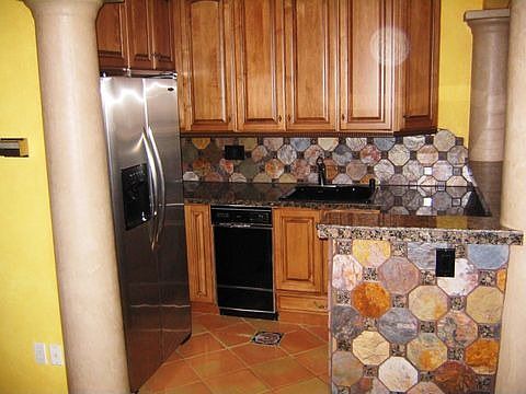 The kitchen is well equipped and modern 