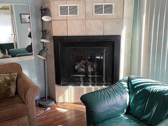 Most recent photo of fireplace.